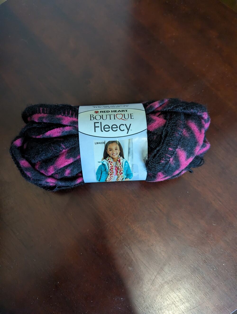 Red Heart Boutique Fleecy Yarn Pink & Black Berry Graphic